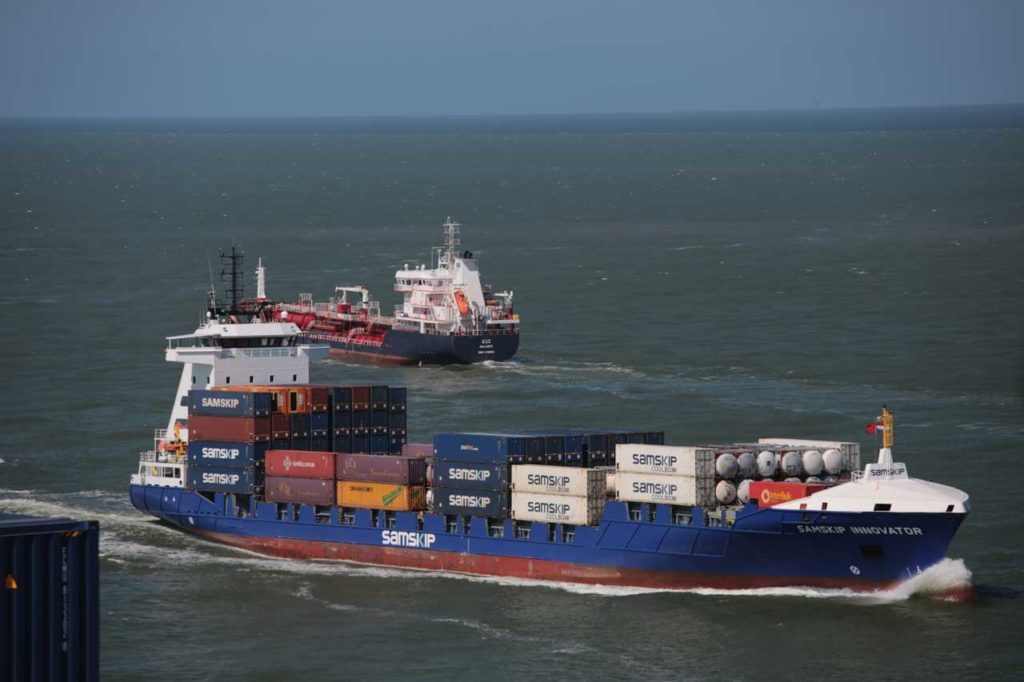 two ocean freighters carrying cargo