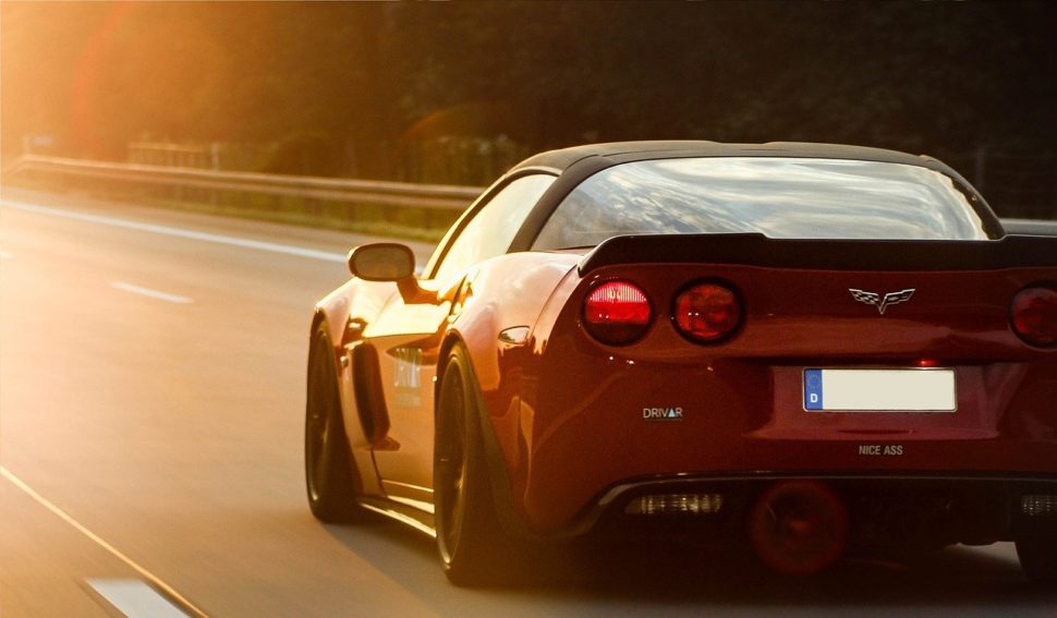a Corvette driving down the highway