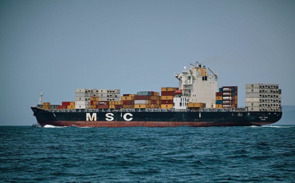Container ship carrying cargo at sea
