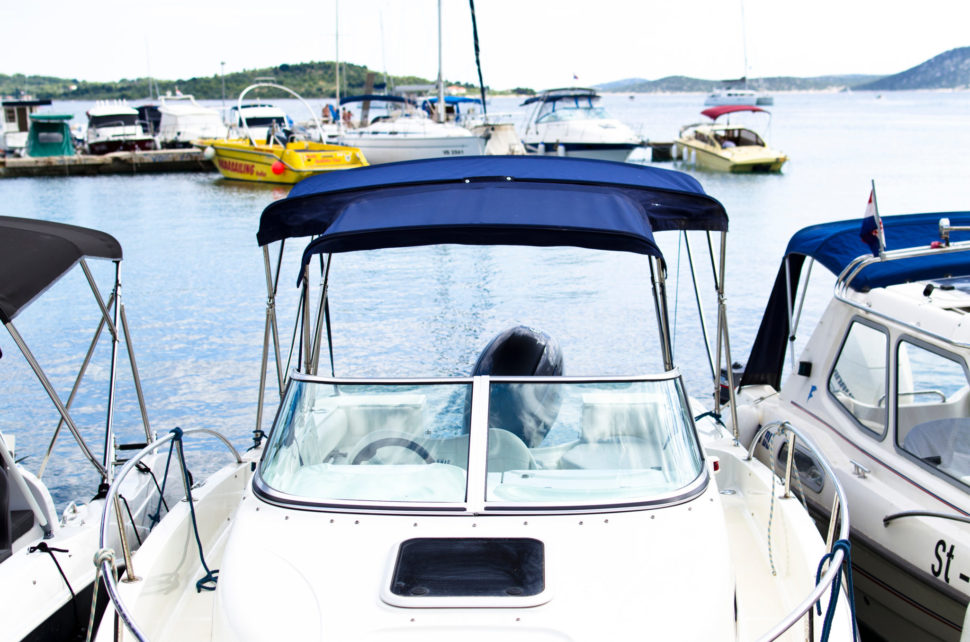 Personal sailboats docked at port