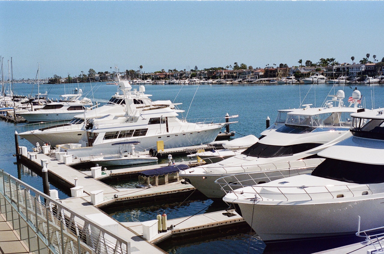 row of yachts on water
