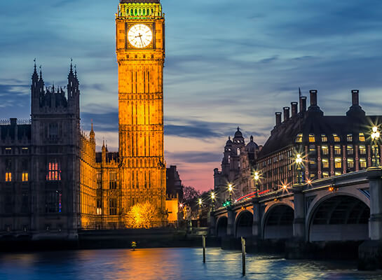 The Big Ben clock tower, Westminster Bridge, and the Thames river in London, England
